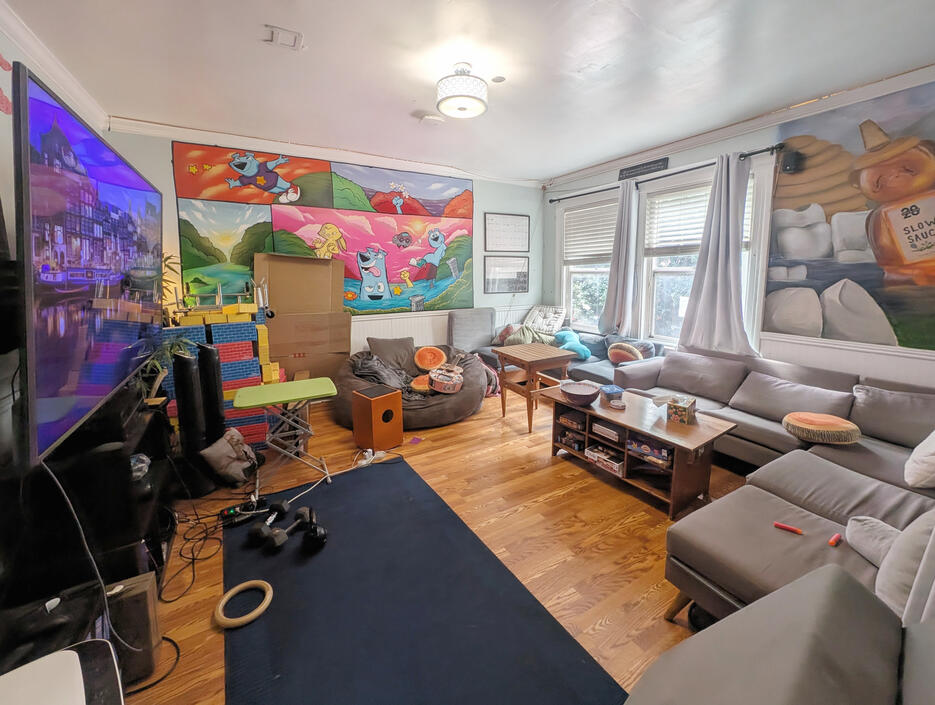 Common room with 85" TV